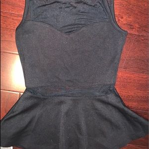 Black peplum tank top with mesh detail